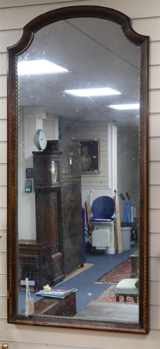 A wall mirror H.136cm